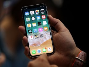 The new iPhone X is displayed during an Apple special event this week in California. Our phones have made us less attentive, less patient, more jumpy, more hungry to be constantly entertained and stimulated, Josh Freed writes.