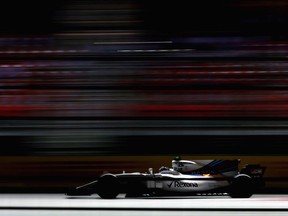 Montreal-born Lance Stroll steers his Williams during Friday practice at the Marina Bay Street Circuit in Singapore.