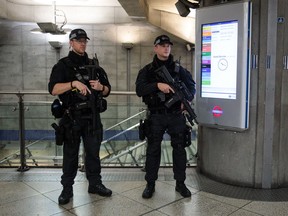 Armed police patrol in Westminster Underground station on September 16, 2017 in London, England. An 18-year-old man has been arrested in Dover in connection with yesterday's terror attack on Parsons Green station in which 30 people were injured. The UK terror threat level has been raised to 'critical'.