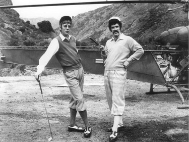 Donald Sutherland as Hawkeye Pierce, left, with Elliott Gould as Trapper John McIntyre in M*A*S*H, the 1970 film adapted from the novel by Richard Hooker, which would later be adapted for TV, with Alan Alda playing Hawkeye.