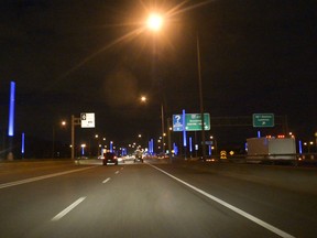 Highway 20's art installation as seen at night.