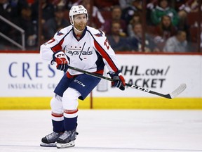 In this March 31, 2017, file photo, Washington Capitals' Karl Alzner skates during the first period in a game against the Arizona Coyotes in Glendale, Ariz.