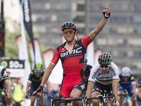 Greg Van Avermaet from Belgium celebrates after winning the Grand Prix Cycling race in Montreal, Sunday, Septermber 11, 2016.