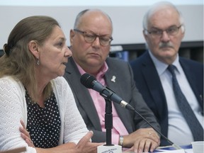 Gina Bravo, Jean-François Lamarche and Jean-Pierre Menard discuss medical assistance in dying for incapacitated persons at a news conference on Thursday marking World Alzheimer's Day.