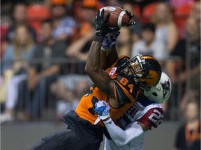 B.C. Lions' Emmanuel Arceneaux (84) makes a reception in the end zone for a touchdown as Montreal Alouettes' Greg Henderson defends during the first half of a CFL football game in Vancouver, B.C., on Friday September 8, 2017.