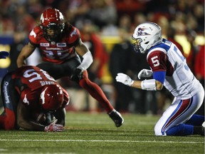 Ja'Gared Davis, Drew Willy

Montreal Alouettes quarterback Drew Willy (5) looks on as Calgary Stampeders defensive lineman Ja'Gared Davis (95) recovers a fumble during second half CFL football action in Calgary, Friday, Sept. 29, 2017. THE CANADIAN PRESS/Jeff McIntosh ORG XMIT: JMC113
Jeff McIntosh,