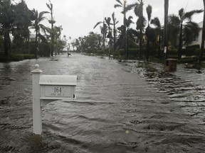 A street is flooded as Hurricane Irma passes through Naples, Fla., Sunday, Sept. 10, 2017. (AP Photo/David Goldman) ORG XMIT: FLDG123
David Goldman, AP