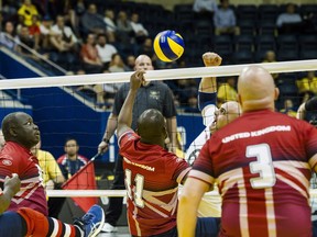 Team Georgia hits against the United Kingdom in the finals of the sitting volleyball competition at the Invictus Games in Toronto on Wednesday.