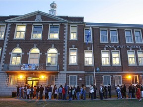 People line up for an open house at Royal West Academy in Montreal West  on Oct. 7, 2008. Grade 6 students seeking admission to elite public high schools or private schools for Secondary 1 generally are required to write entrance exams.