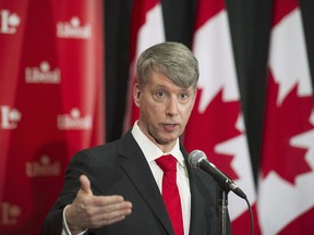 File photo shows Andrew Leslie speaking in Montreal in February 2014.