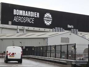 FILE - This is a Sept. 13, 2017 file photo of the Bombardier Aerospace plant in Belfast, Northern Ireland. U.K. Prime Minister Theresa May is "bitterly disappointed" by the U.S. government's decision to slap duties of nearly 220 percent on Canada's Bombardier C series aircraft. May took to Twitter on Wednesday Sept. 27, 2017 to say Britain will continue to work with the company to try to protect jobs, including some 4,000 in Northern Ireland. May has a key alliance with the Northern Ireland-based Democratic Unionist Party. (Brian Lawless/PA, File via AP)