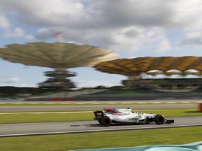 Lance Stroll

Williams driver Lance Stroll of Canada steers his car during the first qualifying run at the Sepang International Circuit for the first practice session for the Malaysian Formula One Grand Prix in Sepang, Malaysia, Saturday, Sept. 30, 2017. (AP Photo/Vincent Thian) ORG XMIT: XVT154
Vincent Thian, AP