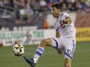 Montreal Impact midfielder Ignacio Piatti (10) gains control of a pass from a teammate during the first half of their MLS soccer game against the New England Revolution, Saturday, Sept. 9, 2017, in Foxborough, Mass.