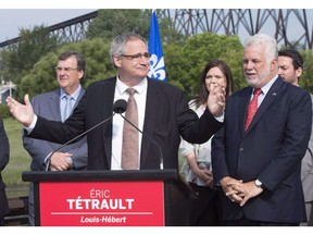 Then Liberal candidate Eric Tetrault, left with Premier Philippe Couillard in August 2017, withdrew from the race on the same day as CAQ candidate Normand Sauvageau.