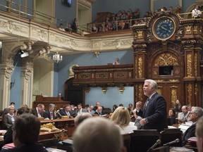 Quebec Premier Philippe Couillard responds to the Opposition during question period May 25, 2016 at the legislature in Quebec City.