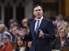 Minister of Finance Bill Morneau stands during question period in the House of Commons on Parliament Hill in Ottawa on Monday, Sept. 18, 2017.