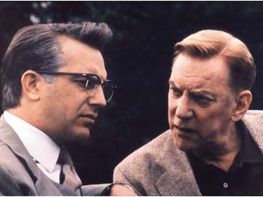 Kevin Costner (left) and Donald Sutherland in a scene from Oliver Stone's 1991 film JFK. Costner played Jim Garrison to Sutherland's X.