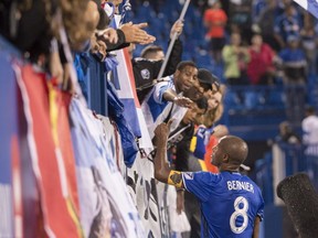 Impact midfielder Patrice Bernier greets fans following their 1-0 loss to the New York City FC in MLS action on Wednesday, Sept. 27, 2017, in Montreal.