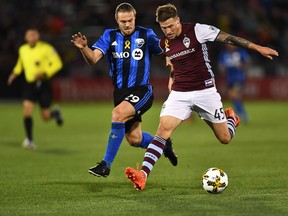 Montreal Impact midfielder Samuel Piette (29) and Colorado Rapids midfielder Joshua Gatt (45) battle for the ball in the first half at Dick's Sporting Goods Park in Commerce City, Colo., on Saturday, Sept. 30, 2017.