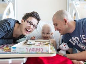 Zoë and her parents at the Sainte-Justine Hospital.