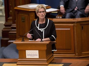 Ontario Premier Kathleen Wynne speaks at the National Assembly in Quebec City on Thursday.