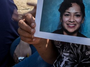 Bunny Paris holds a photo of Kimberly Gloade in Montreal, on Wednesday, August 2, 2017.