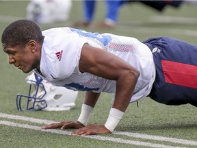 The traditional pushup may be ho-hum for some fitness buffs, but they're still the norm for pros like Alouettes receiver Malcolm Carter, shown at training camp May 29, 2017.