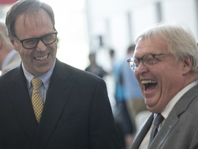 Peter Kruyt, left, the new chairman of the board at the MUHC, is seen with Quebec Health Minister Gaétan Barrette at the hospital on Monday, Sept, 18, 2017.
