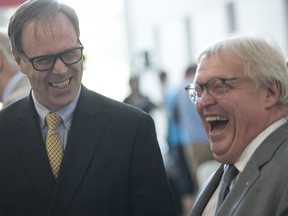 Peter Kruyt, the newly appointed chairman of the MUHC, is seen with Health Minister Gaétan Barrette in September. There have been concerns over the selection process for a new CEO.