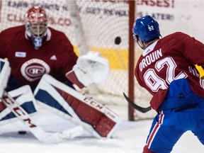 Jonathan Drouin fires shot at goalie Carey Price during Canadiens practice at the Bell Sports Complex in Brossard on Sept. 19, 2017.