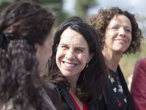 Projet Montréal Leader Valerie Plante, centre, is shown with Côte-des-Neiges-N.D.G. candidate Sue Montomery, right, on Oct. 5, 2017.