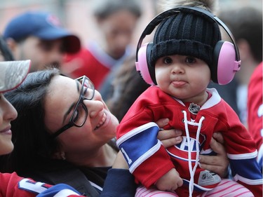 Eight month-old Leah Debies gets ready for her first Habs game with her mother Rim Mourad outside the Bell Centre, prior to the game against the Chicago Blackhawks on Tuesday October 10, 2017.