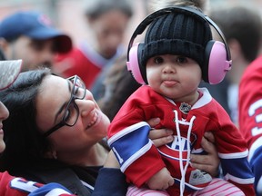 Eight month-old Leah Debies gets ready for her first Habs game with her mother, Rim Mourad, outside the Bell Centre, prior to the game against the Chicago Blackhawks on Tuesday October 10, 2017.