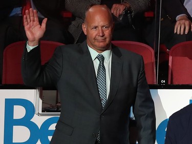 Montreal Canadiens' coach Claude Julien waves to crowd prior to the home opener against the Chicago Blackhawks at the Bell Centre in Montreal on Tuesday October 10, 2017.