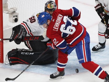 Montreal Canadiens' Artturi Lehkonen (62) looks for the puck in front of Chicago Blackhawks' Corey Crawford, during third-period NHL action in Montreal on Tuesday October 10, 2017.