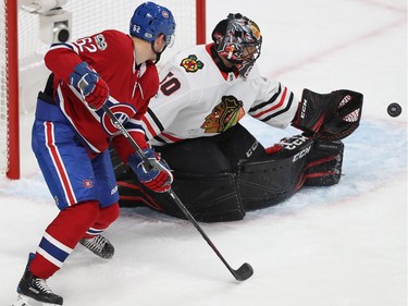 Montreal Canadiens' Artturi Lehkonen (62) looks on as Chicago Blackhawks goalie Corey Crawford stops puck, during first period NHL action in Montreal on Tuesday October 10, 2017.