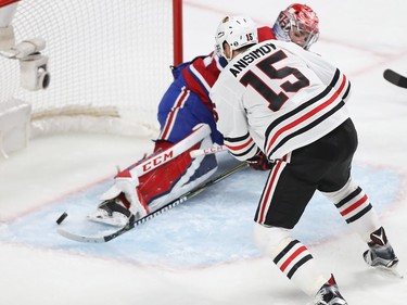 Chicago Blackhawks' Artem Anisimov (15) beats Montreal Canadiens goalie Carey Price to score only goal of second period NHL action in Montreal on Tuesday October 10, 2017.