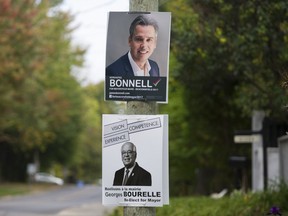 Election signs in Beaconsfield for incumbent Georges Bourelle and James Bonnell, who is running for a second time for the mayor's office.