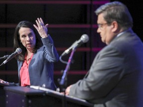 Projet Montréal Leader Valérie Plante and incumbent mayor Denis Coderre are seen during English-language debate in Montreal on Monday, Oct. 23, 2017.