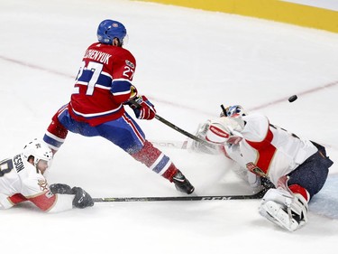 Montreal Canadiens Alex Galchenyuk shoots the puck over Florida Panthers James Reimer for a goal as Panthers defenceman Michael Matheson misses the stick check during second period of National Hockey League game in Montreal Tuesday October 24, 2017.