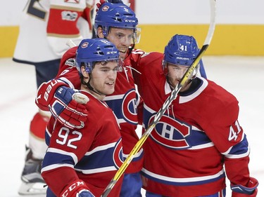 Montreal Canadiens Shea Weber, centre, celebrates his second goal of the game against the Florida Panthers with teammates Jonathan Drouin, left, and Paul Byron during third period of National Hockey League game in Montreal Tuesday October 24, 2017.