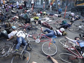 The scene was stark at the Saturday, Oct. 28, 2017, "die-in" and that was the idea. Cycling advocates want safer streets. "If (the city) continues to not do anything, people will continue dying,” activist Gabrielle Anctil says.