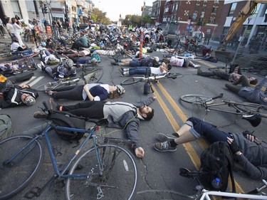 The Montreal "Die-in", at Parc and St-Viateur Oct. 28, 2017, was staged at “a site where we set up a ghost bike four years ago. And since then, nothing has changed.” said Gabrielle Anctil of Ghost Bike Montreal. (Christinne Muschi / MONTREAL GAZETTE)