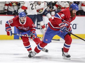 Montreal Canadiens' Victor Mete, left, teams up on defence with Jordie Benn during second period of National Hockey League game against the Florida Panthers in Montreal Friday September 29, 2017.