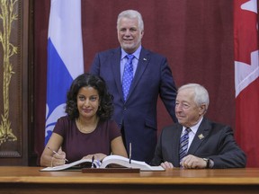 Dominique Anglade is sworn in as Vice-Premier, minister of Economy, Science and Innovation and digital strategy of the new Liberal cabinet at the National Assembly in Quebec City, Wednesday, October 11, 2017.