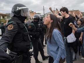 More than five million eligible Catalan voters are estimated to visit 2,315 polling stations Sunday for  Catalonia's referendum on independence from Spain.