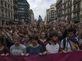 Students hold a silent protest against the violence that marred Sunday's referendum vote outside the University Monday in Barcelona, Spain. Catalonia's government met Monday to discuss plans to declare independence after the results of the disputed referendum. (Photo by Dan Kitwood/Getty Images)