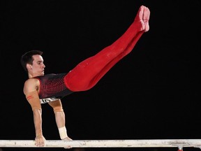 Zachary Clay of Canada competes on the parallel bars during day one of the Artistic Gymnastics World Championships on Oct. 2, 2017 at Olympic Stadium in Montreal.