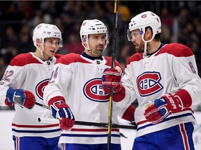 Canadiens' Shea Weber #6, Tomas Plekanec #14 and Artturi Lehkonen ather to talk before a faceoff against the Los Angeles Kings at Staples Center on October 18, 2017 in Los Angeles.
