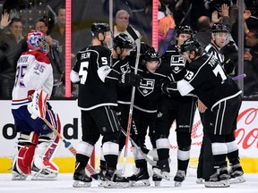 Michael Cammalleri #14 of the Los Angeles Kings celebrates his goal with teammates in front of Al Montoya #35 of the Montreal Canadiens to take a 3-1 lead over the Montreal Canadiens during the third period at Staples Center on October 18, 2017 in Los Angeles, California.